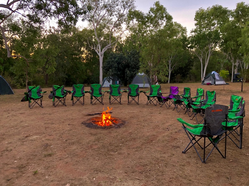chairs around a campfire