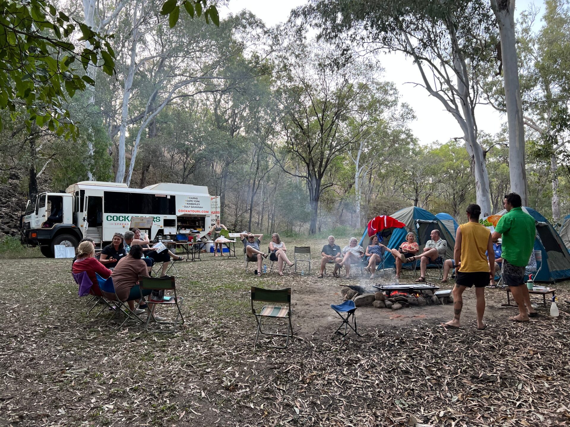 people around a fire on a cape york tour