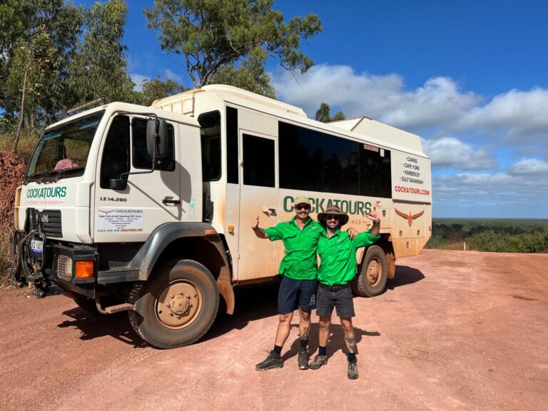 two guides next to a cape york tour truck
